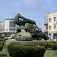 Traffic moves around a sculpture of a giant pair of sandals which has been built on a roundabout in the center of Asmara, Eritrea, Oct. 11, 2001. The sandals are the latest monument to the 30-year war Eritreans endured to win independence from neighboring Ethiopia.